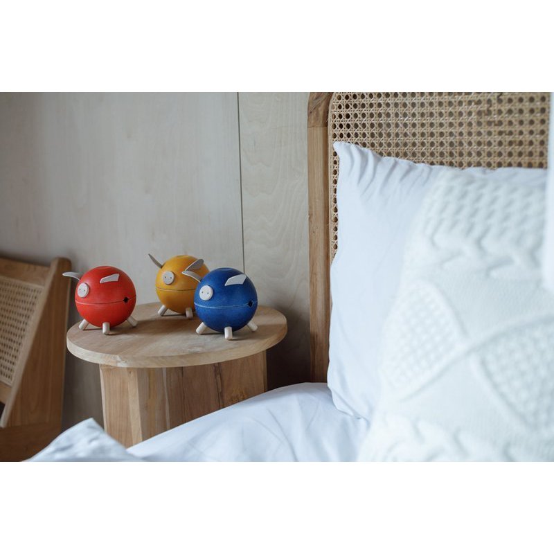 Plan Toys - Świnka skarbonka - żółta - barwy sadu