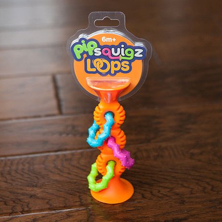 Far Brain Toy Co. - FA165-1 Bobo Przyssawki Grzechotka Pomarańczowa. PipSquigz Loops.