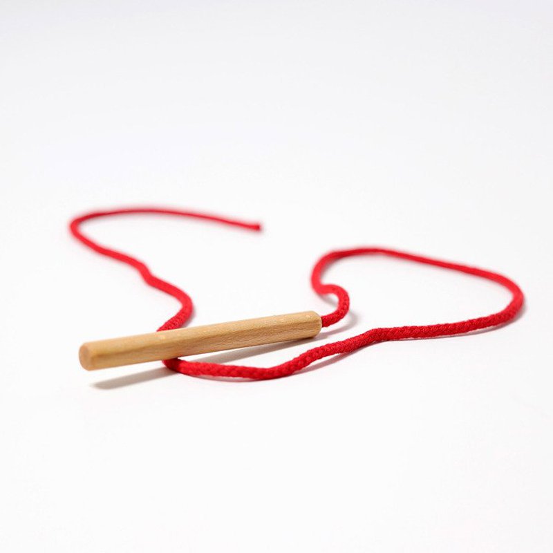 Drewniana Igła, Grimm's